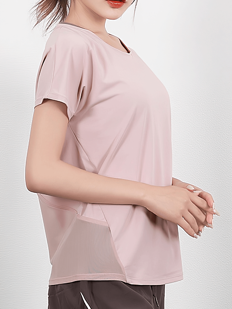 Short Sleeves Mesh Loose Yoga T-Shirt with Beautiful Back for Women, breathable and quick-dry spandex, pink color, side view.